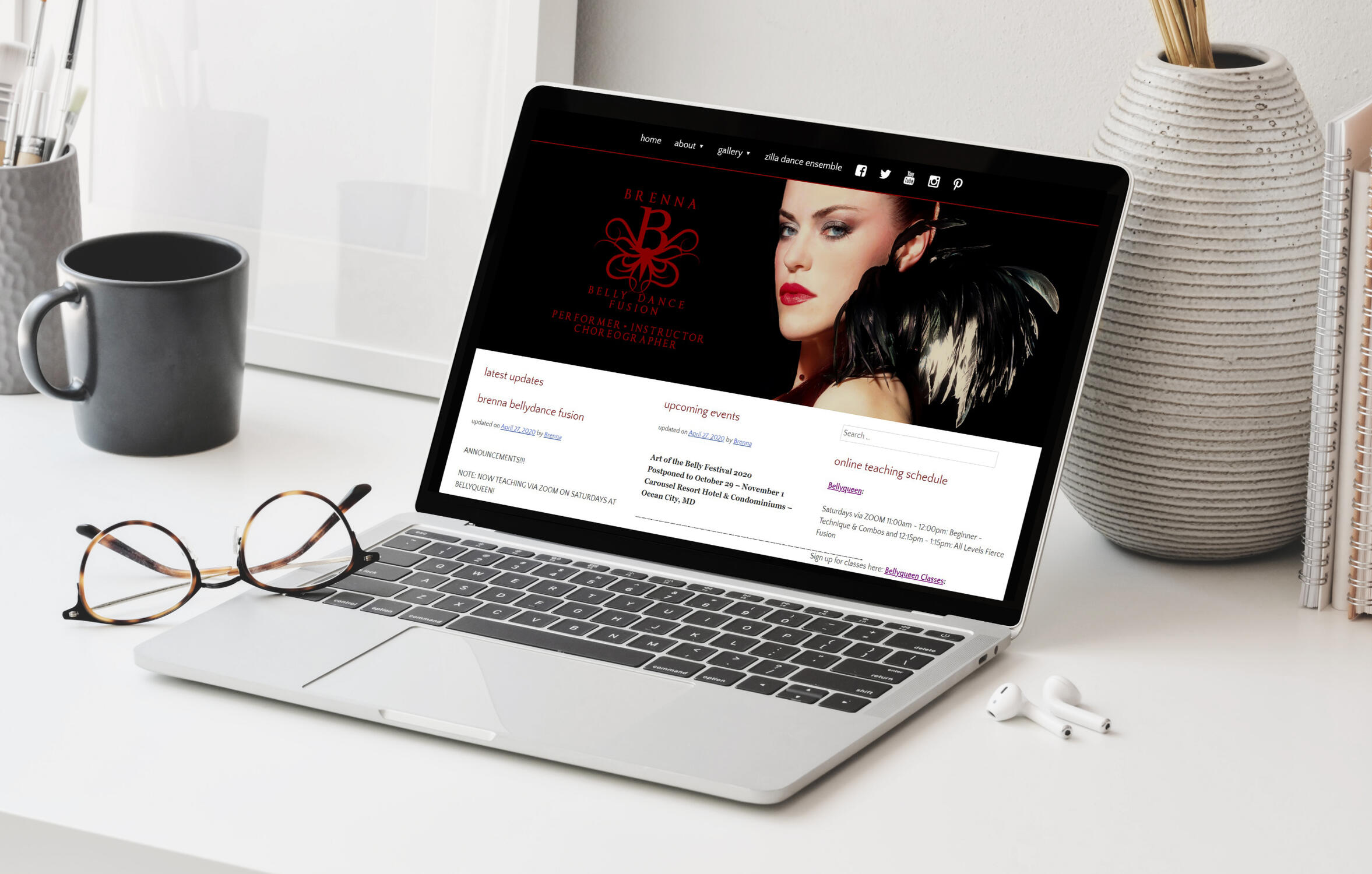 Brenna BellyDance A laptop screen showing Brenna Bellydance's homepage.